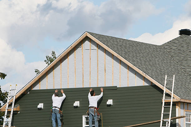 Professional Emergency Siding Repair technician working in Karns City, PA